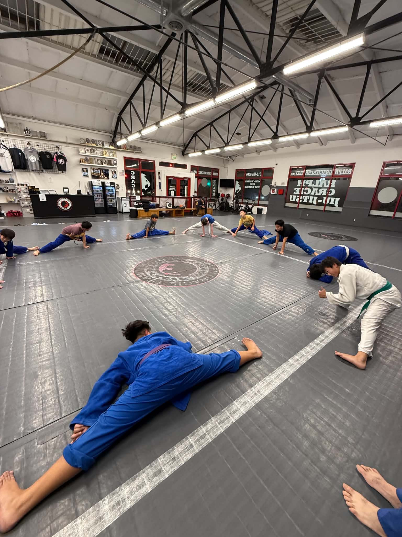 Students stretching together before practice